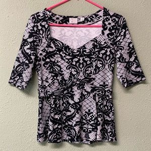 Anthropologie Postage stamp lace print top